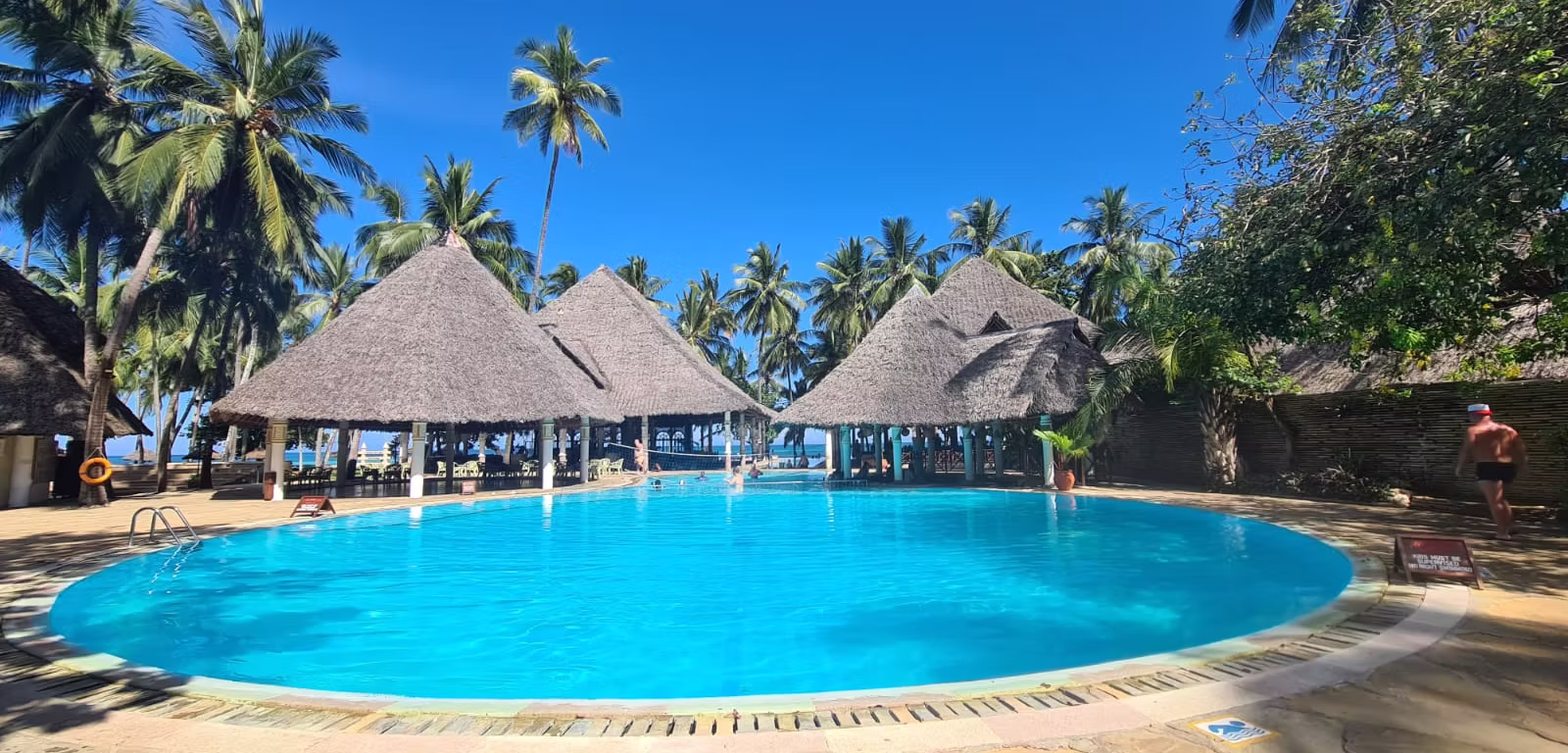 Kenya’s Coast offers idyllic beaches, crystal-clear waters, and rich Swahili culture. From the vibrant city of Mombasa to serene islands like Lamu, it’s a paradise of sun, sea, and history waiting to be explored. Kenya’s Coast is a tropical paradise where white sandy beaches meet crystal-clear turquoise waters, backed by rich cultural heritage and vibrant Swahili traditions. Stretching from the bustling port city of Mombasa to the serene islands of Lamu and Watamu, the coast offers something for every traveler. Mombasa’s Old Town, with its narrow alleys, historic Fort Jesus, and colorful markets, provides a glimpse into the region’s diverse past shaped by Arab, Portuguese, and British influences. Beyond the cities, Kenya’s coastal waters teem with marine life, making it a top destination for snorkeling and diving, especially in protected areas like Watamu Marine Park. The palm-fringed beaches, warm waters, and colorful coral reefs are perfect for water sports, while dhow cruises and island hopping offer unique ways to explore the coastline. Diani Beach, known for its powdery sands and laid-back vibe, is a favorite among travelers looking to unwind or enjoy thrilling adventures like kite surfing and jet skiing. The coastal region is also deeply rooted in Swahili culture, where visitors can experience local cuisine, music, and traditional crafts. From exploring ancient ruins like Gede to savoring fresh seafood and spicy Swahili dishes, the Kenyan Coast is a sensory journey through history, relaxation, and adventure. Whether you’re looking to explore lively markets, relax on sun-soaked beaches, or dive into a world of marine wonders, the Kenyan Coast offers an unforgettable experience steeped in natural beauty and cultural richness.