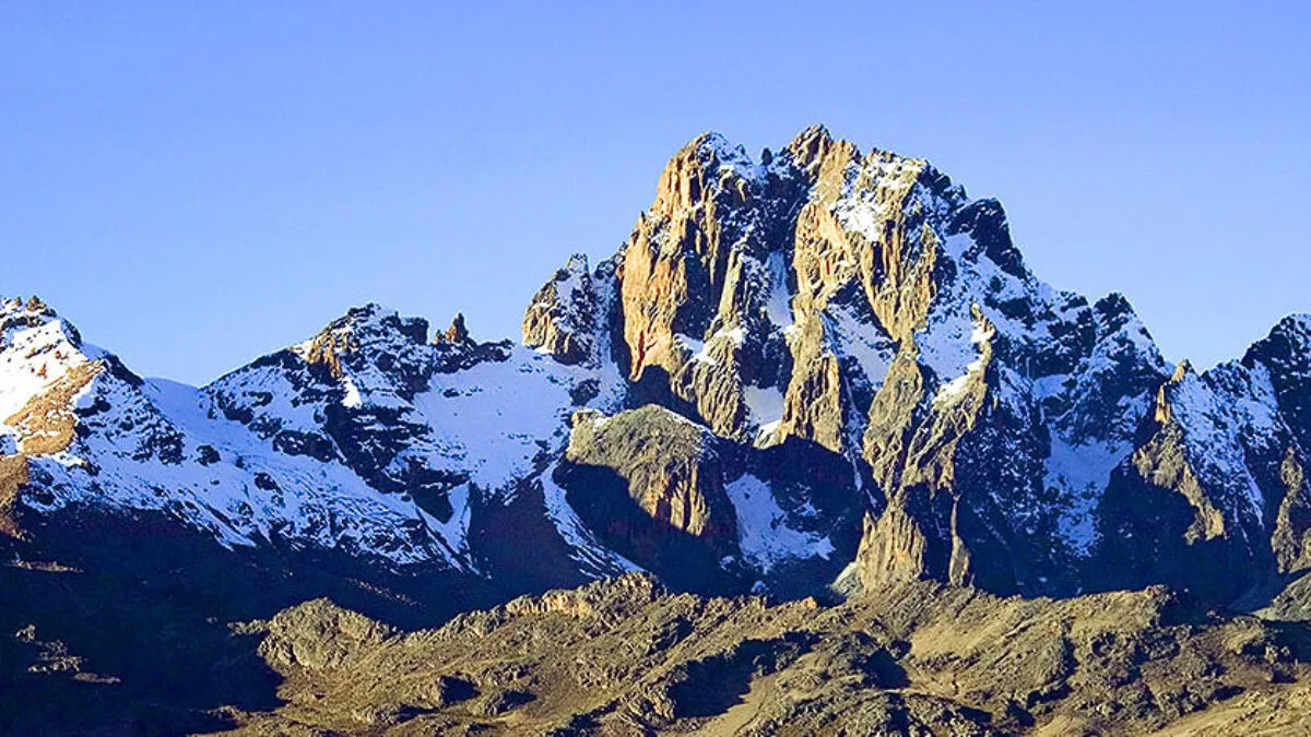 Mount Kenya, Africa’s second-highest peak, offers breathtaking landscapes, unique flora and fauna, and unforgettable hiking adventures. Mount Kenya, standing proudly as Africa’s second-highest mountain, is a UNESCO World Heritage site and one of Kenya’s most iconic landmarks. Rising to 5,199 meters (17,057 feet), this majestic peak offers a truly diverse ecosystem that ranges from dense forests and bamboo thickets to alpine meadows and glacial summits. Its rugged terrain and spectacular landscapes make it a paradise for hikers and nature enthusiasts, with routes that cater to varying levels of expertise—from challenging climbs to leisurely forest walks. The mountain is home to unique flora and fauna, including the remarkable giant lobelias and groundsels found only in these high-altitude regions. Wildlife such as elephants, buffalo, and Colobus monkeys inhabit the lower forests, while elusive species like the Mount Kenya hyrax and alpine birds make the higher slopes their home. Mount Kenya is also a site of cultural significance, holding a revered place in local Kikuyu and Meru communities who view it as a sacred dwelling of the gods. For climbers and adventurers, the ascent to peaks like Lenana, Batian, and Nelion is a test of endurance and awe-inspiring natural beauty, with panoramic views of the plains below. Beyond its natural beauty and adventure appeal, Mount Kenya offers a profound sense of connection to Kenya's heritage and ecological richness. Whether trekking through lush forests, crossing high-altitude moorlands, or reaching snowy summits, every step is a journey through one of Kenya’s most spectacular wonders.